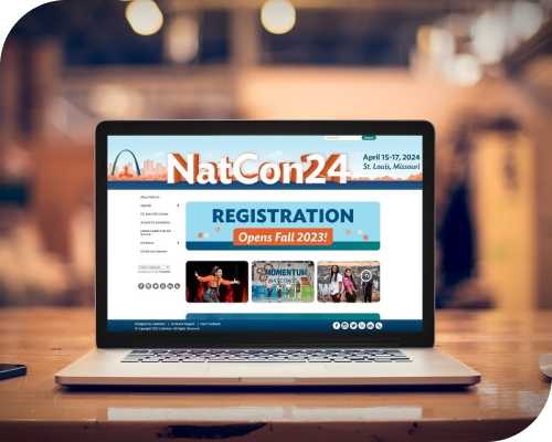 The NatCon24 website on a laptop.